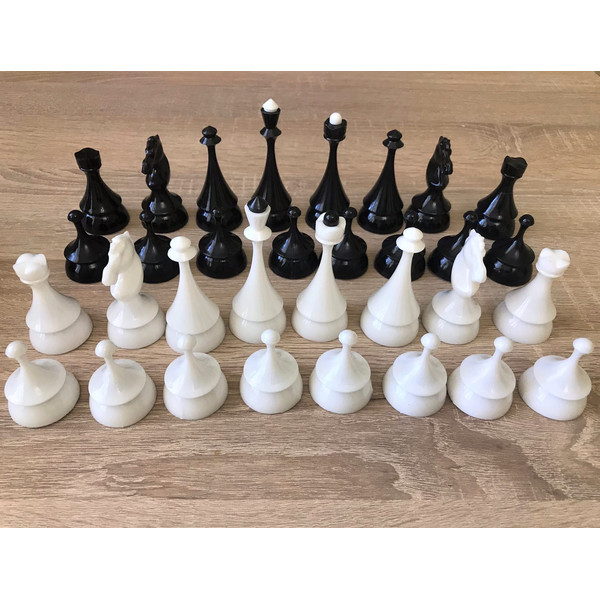 plastic chessmen set vintage new black white