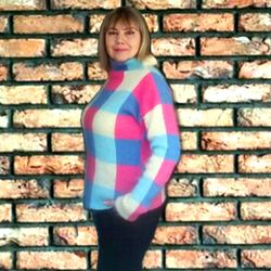 Bright knitted sweater turtleneck for woman. Square multicolor sweater. High neck check mohair turtleneck.