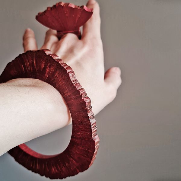 hand, red bracelet, red ring