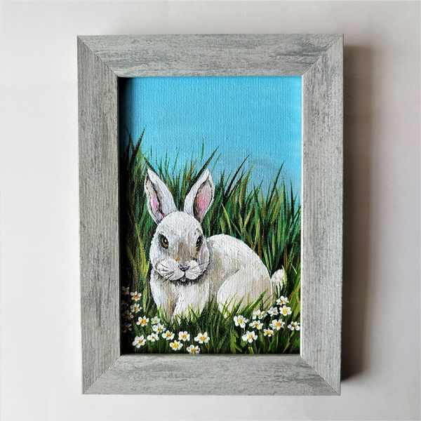 White-rabbit-sitting-on-a-flower-meadow-small-painting-acrylic-framed-art.jpg