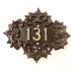 Old-fashioned address number 131 apartment plaque sign vintage