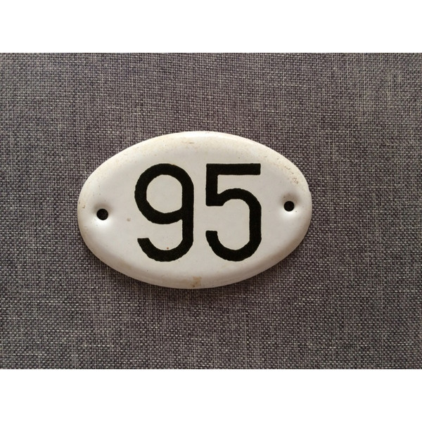 95 apartment address number plate sign white black