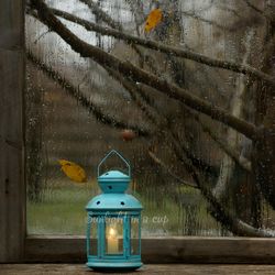 Picture of a lit lantern on a gloomy damp autumn window, fine art photography, nature photography, printable poster
