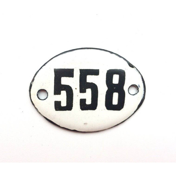 room number 558 vintage address plate white black