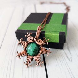 wire wrapped copper necklace with malachite bead. star pendant with malachite.