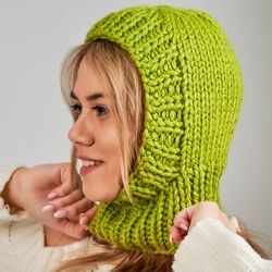 Knitted balaclava. Bulky wool. Light green color