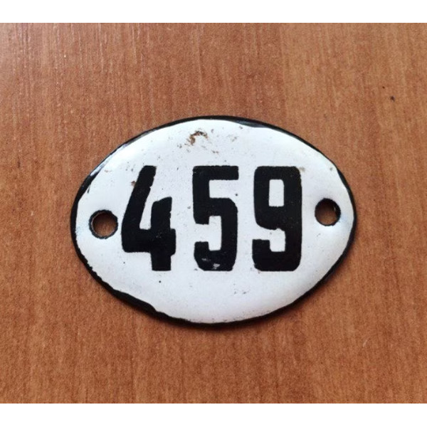 white black small apartment door number sign 459