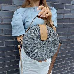 Round shoulder bag for women. Gray bag with long and short handles. Handmade wicker bag