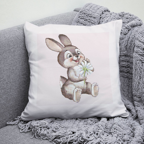 4 Funny Bunny guessing on a chamomile cross stitch pattern.jpg