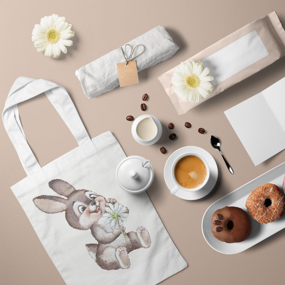 5 Funny Bunny guessing on a chamomile cross stitch pattern.jpg