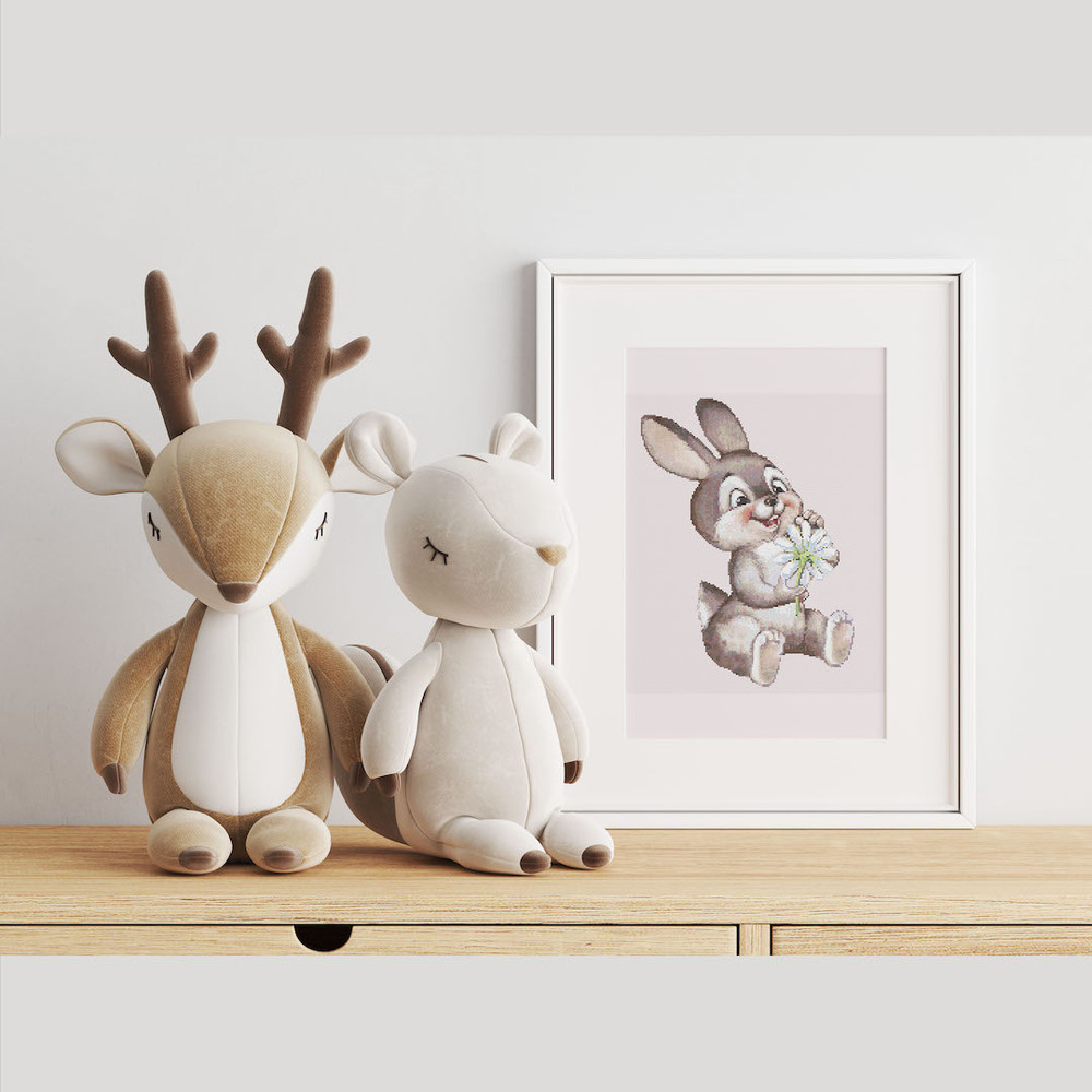 6 Funny Bunny guessing on a chamomile cross stitch pattern.jpg