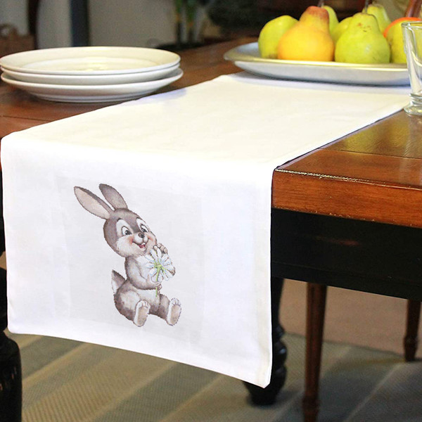 12 Funny Bunny guessing on a chamomile cross stitch pattern.jpg