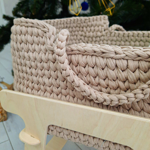 Baby basket for dolls, handmade in beige on a wooden base