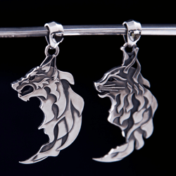 Paired pendants a wolf and a cat with gems