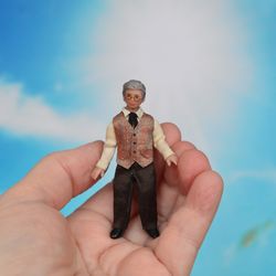 Man doll in 1/24 scale.  Miniature doll for a dollhouse.