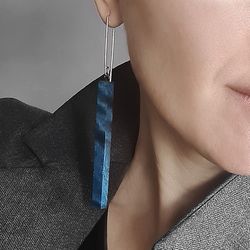 Long thin earrings in a minimalist style