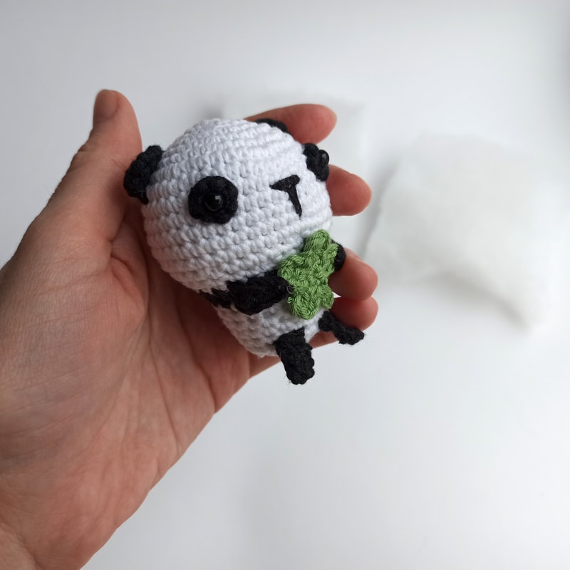Amigurumi Panda Keychain on the hand 1.jpg