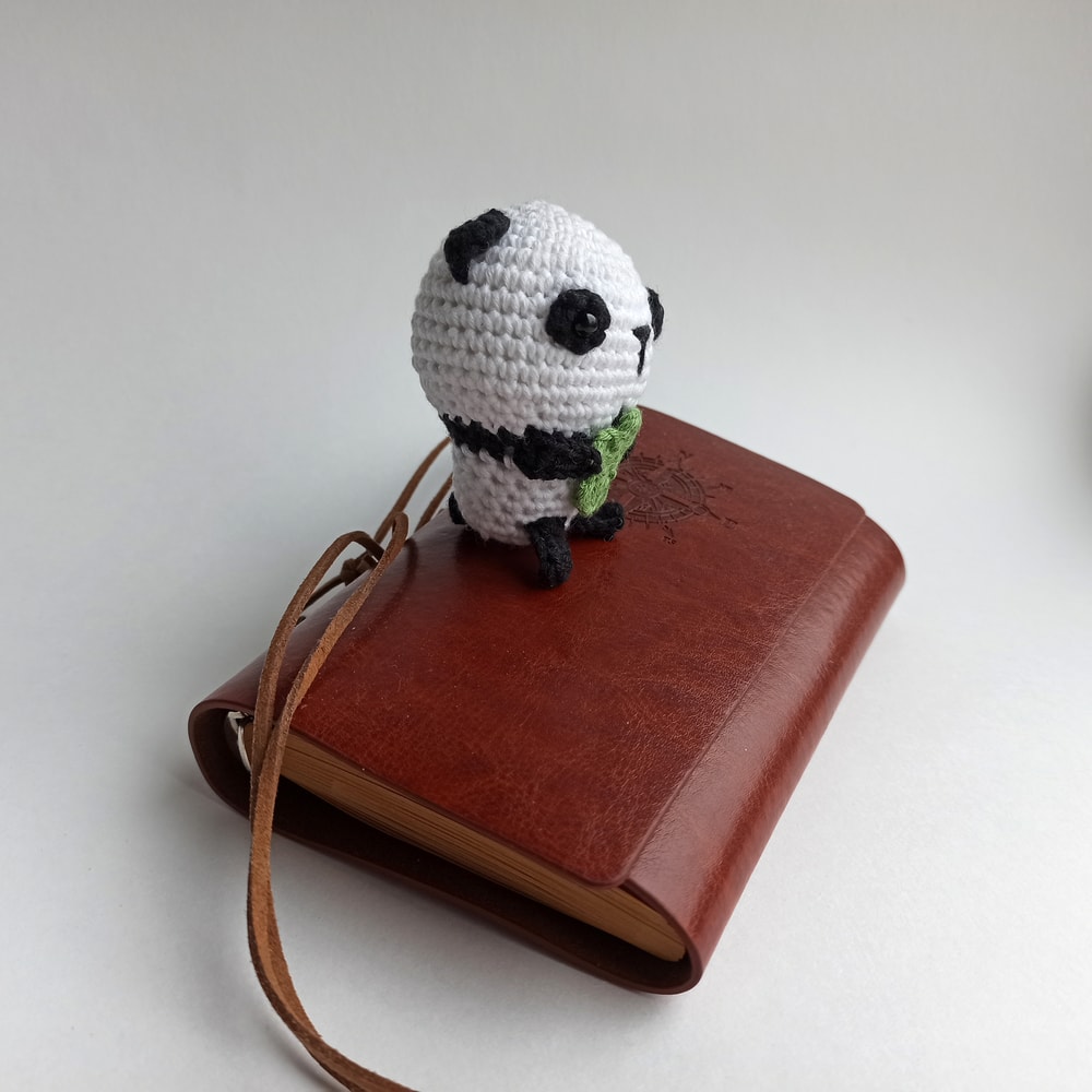 Amigurumi Panda Keychain on the brown notepad 2.jpg