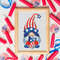 red-firecrackers-ribbon-and-usa-flag-badges-around-the-blank-wooden-white-board.jpg