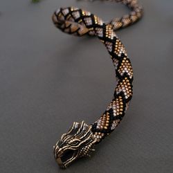 Dragon necklace made of beads and bronze