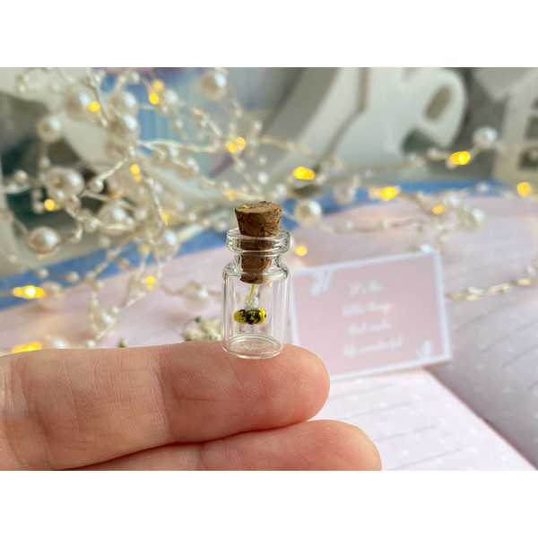 micro-bee-in-glass-bottle-necklace.jpeg