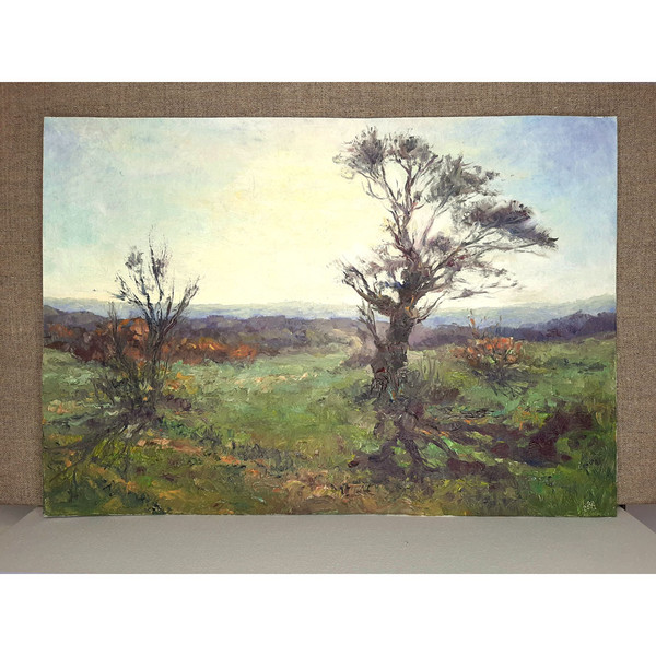 Original Oil Art stands on canvas background. High tree at dawn painting.
