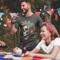 tattooed-man-wearing-a-tshirt-mockup-drinking-a-beer-at-a-4th-of-july-bbq-party-a20832 (5).png