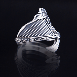 Silver ring with Celtic harp and leaves