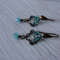 Vintaj solid and natural copper earrings Textured patinated with a Aquamarine bead and chain