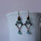 Vintaj solid and natural copper earrings Textured patinated with a Aquamarine bead and chain