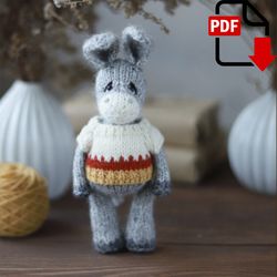 Knitted donkey DIY. Amigurumi pattern in English and Russian.