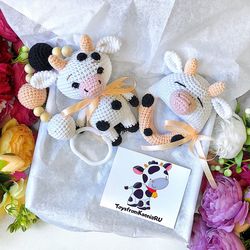 Baby gift box cow. Baby rattle, stroller toy