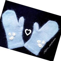 handknitted mittens with delicate floral embroidery