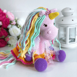 Crochet animal. Unicorn toy pink, purple