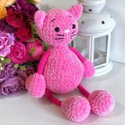 Crochet animal. Plush cat pink