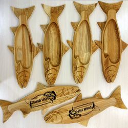 Personalized wooden plates in the form of fish