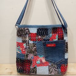 Pretty quilted handbag in the patchwork and boro style made of pieces of denim and cotton