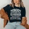 nobody-watches-you-harder-than-the-people-that-can-t-stand-you-tee-black-heather-s-peachy-sunday-t-shirt