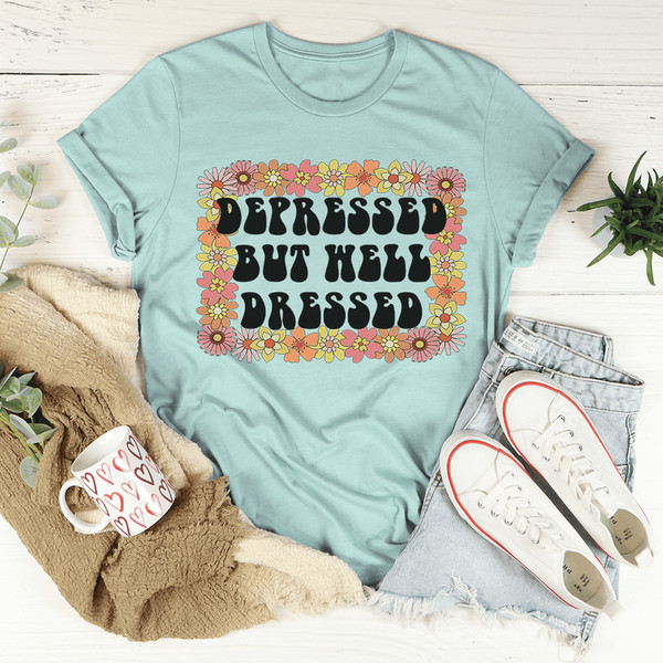 depressed-but-well-dressed-tee-heather-prism-dusty-blue-s-peachy-sunday-t-shirt