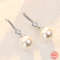 925-sterling-silver-long-pearl-cz-dangle_main-1.jpg