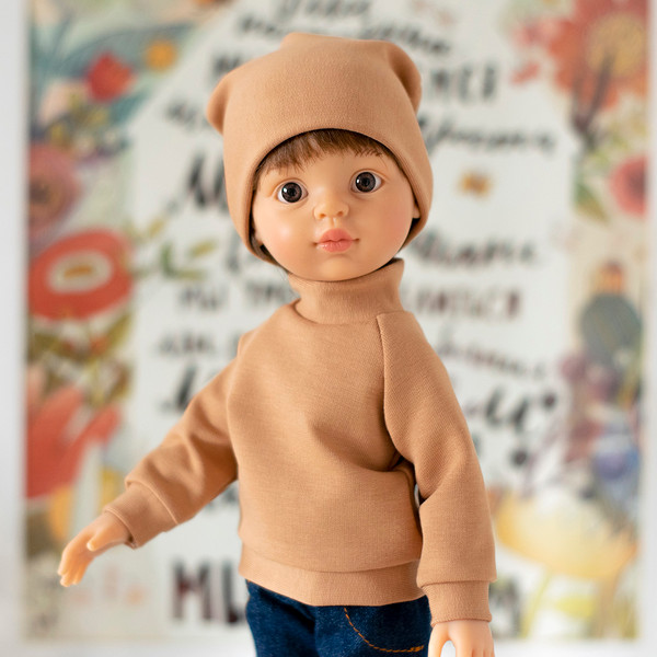 Paola Reina boy doll in beige hoodie and beanie