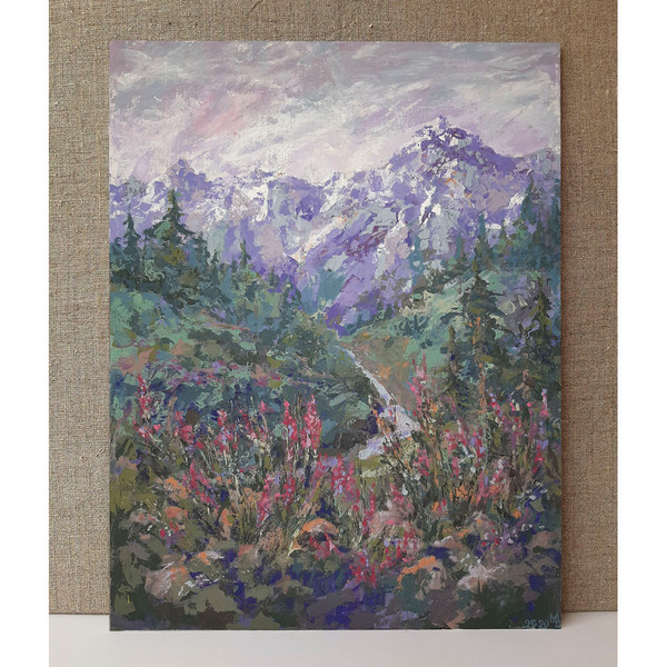Original interior painting stands on canvas background. Lilac Mountain Landscape will decorate your home.