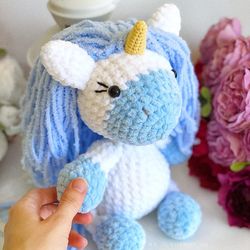 Crochet animal. Unicorn plush toy blue