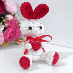 Crochet animal. Bunny with red heart