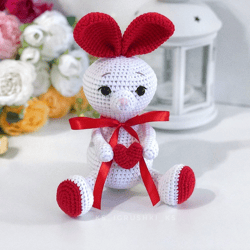 Crochet animal. Bunny with red heart