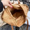 1 Womans Minimalist Drawstring Design Straw Bag.jpg