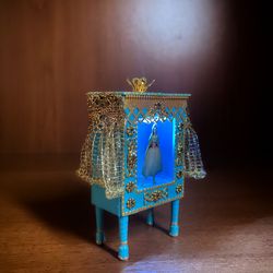 Miniature puppet theater for doll houses.Illuminated theater.