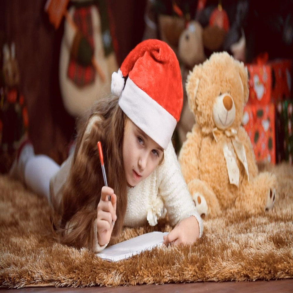 1080x1080 size mixkit-girl-writes-a-letter-laying-by-the-christmas-tree-19791-medium.00_00_00_22.Quadro001.jpg