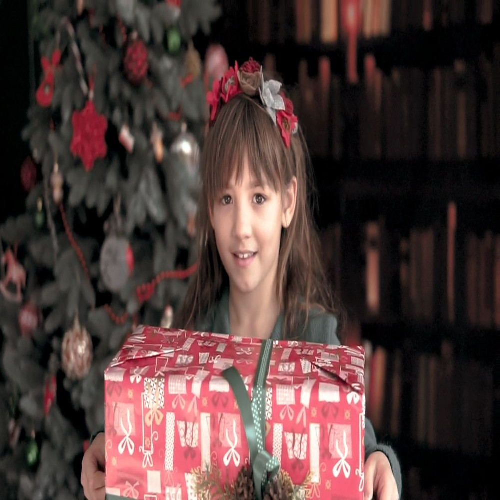 1080x1080 size mixkit-happy-little-girl-waving-her-christmas-gift-9217-medium.00_00_02_19.Quadro001.jpg