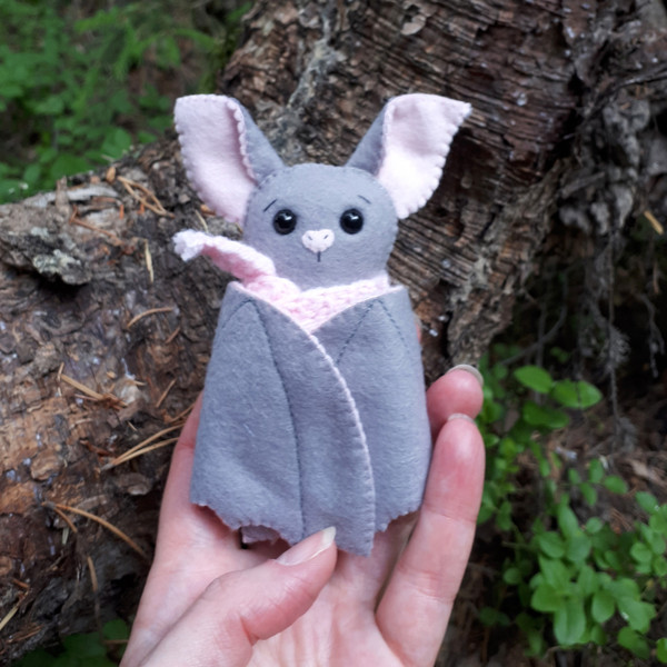 Grey-Bat-plush-in-the-woods